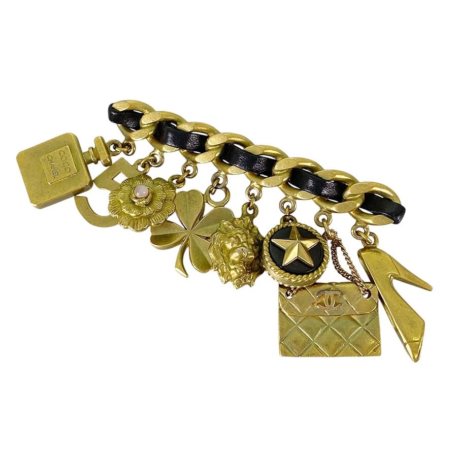 CHANEL ICON GOLD PLATED FAKE PEARL BROOCH: CHANEL Icon Gold plated Fake pearl Brooch Brand: CHANEL Type/Style: Brooch Material: Gold Plated Color: Gold Size: full length:83.9mm Accessories: None Accessories Notice: When purchasing