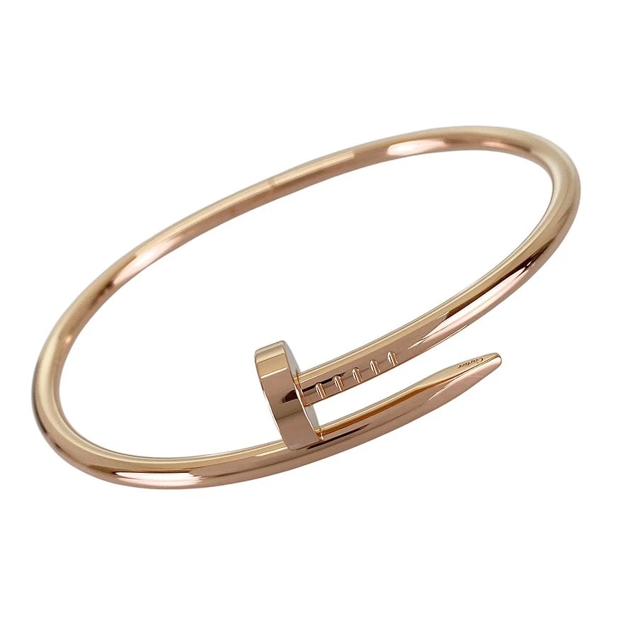 CARTIER JUSTE UN CLOU ROSE GOLD BRACELET: Cartier Juste un Clou Rose gold Bracelet Brand: Cartier Type/Style: Bracelet Material: 18K Rose Gold Color: Gold Size: width:3.5mm~14.0mm Wrist Size:18.5cm Accessories: None Accessories No