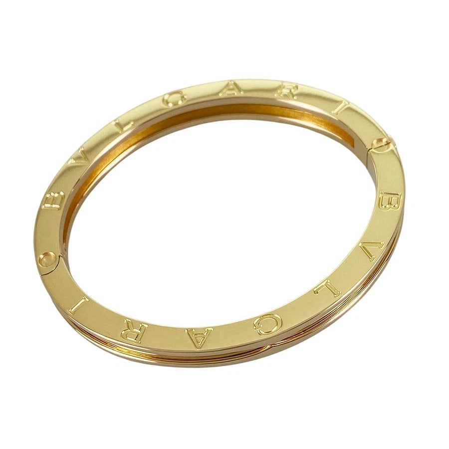 BVLGARI B.ZERO1 YELLOW GOLD BANGLE: BVLGARI B.zero1 Yellow gold Bangle Brand: BVLGARI Type/Style: Bangle Material: 18K Yellow Gold Color: Gold Size: width:7.2mm Wrist Size:16.5cm Accessories: None Accessories Notice: When pu