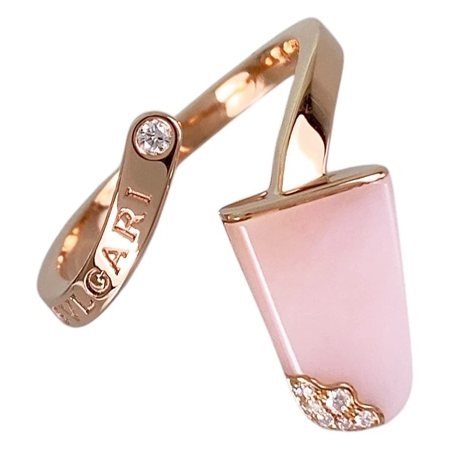 BVLGARI GERATI ROSE GOLD OPAL DIAMOND RING: BVLGARI Gerati Rose gold Opal Diamond Ring Brand: BVLGARI Type/Style: Ring Material: 18K Rose Gold Color: Gold Size: 5.5-6 US Accessories: None Accessories Notice: When purchasing pre-owne