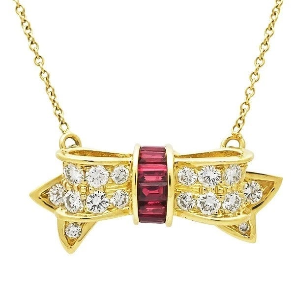 TIFFANY & CO RIBBON BOW RUBY DIAMOND PENDANT NECKLACE: Tiffany & Co Ribbon Bow Ruby Diamond Pendant Necklace Brand: Tiffany & Co. Type/Style: Necklace Material: 18k Yellow Gold, Main Stone Natural Color: Yellow Size: Chain Length: Approx. 42.0 cm / 16.5 i