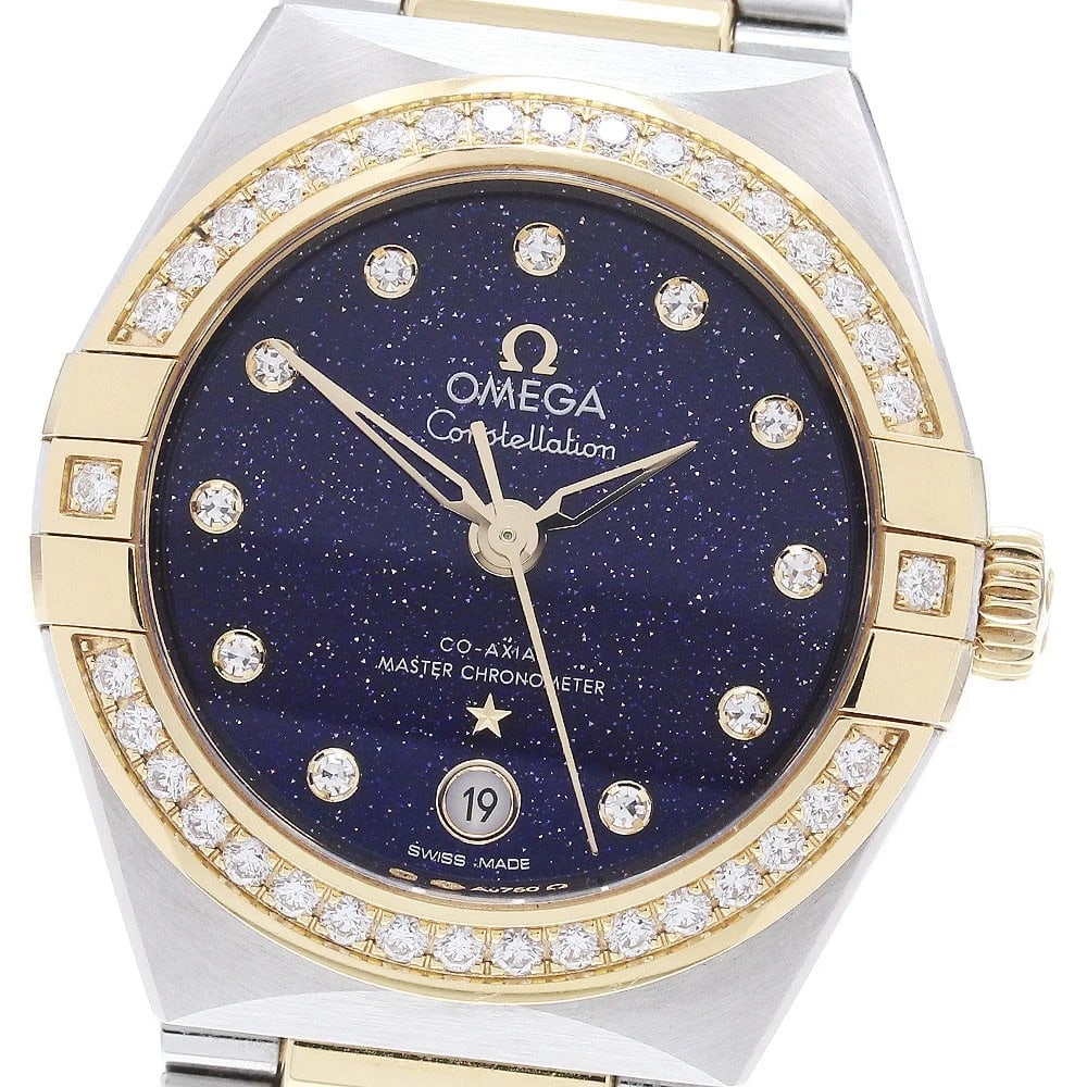OMEGA CONSTELLATION MANHATTAN DIAMOND BEZEL AT WATCH: OMEGA Constellation Manhattan Diamond Bezel AT Watch Brand: OMEGA Type/Style: Wristwatch Material: Band Material Stainless Steel/YG, Case Material Stainless Steel/YG Color: Dial Color Navy Size: Case 