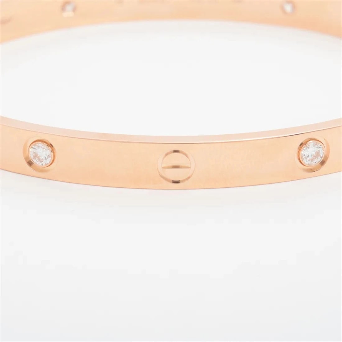 CARTIER LOVE HALF DIAMOND BRACELET: Cartier Love half diamond Bracelet Brand: Cartier Type/Style: Bracelet Material: 750(PG) Color: pink gold Size: Bracelet length:18.3cm Accessories: None Accessories Notice: When purchasing pre-owned