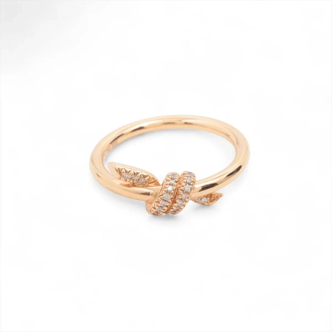 TIFFANY KNOT DIAMOND RING 750(PG): Tiffany Knot diamond Ring 750(PG) Brand: Tiffany Type/Style: Ring Material: 750(PG), Main Stone Natural Color: Pink Gold Size: 3.75 - 4 US Accessories: None Accessories Notice: When purcha