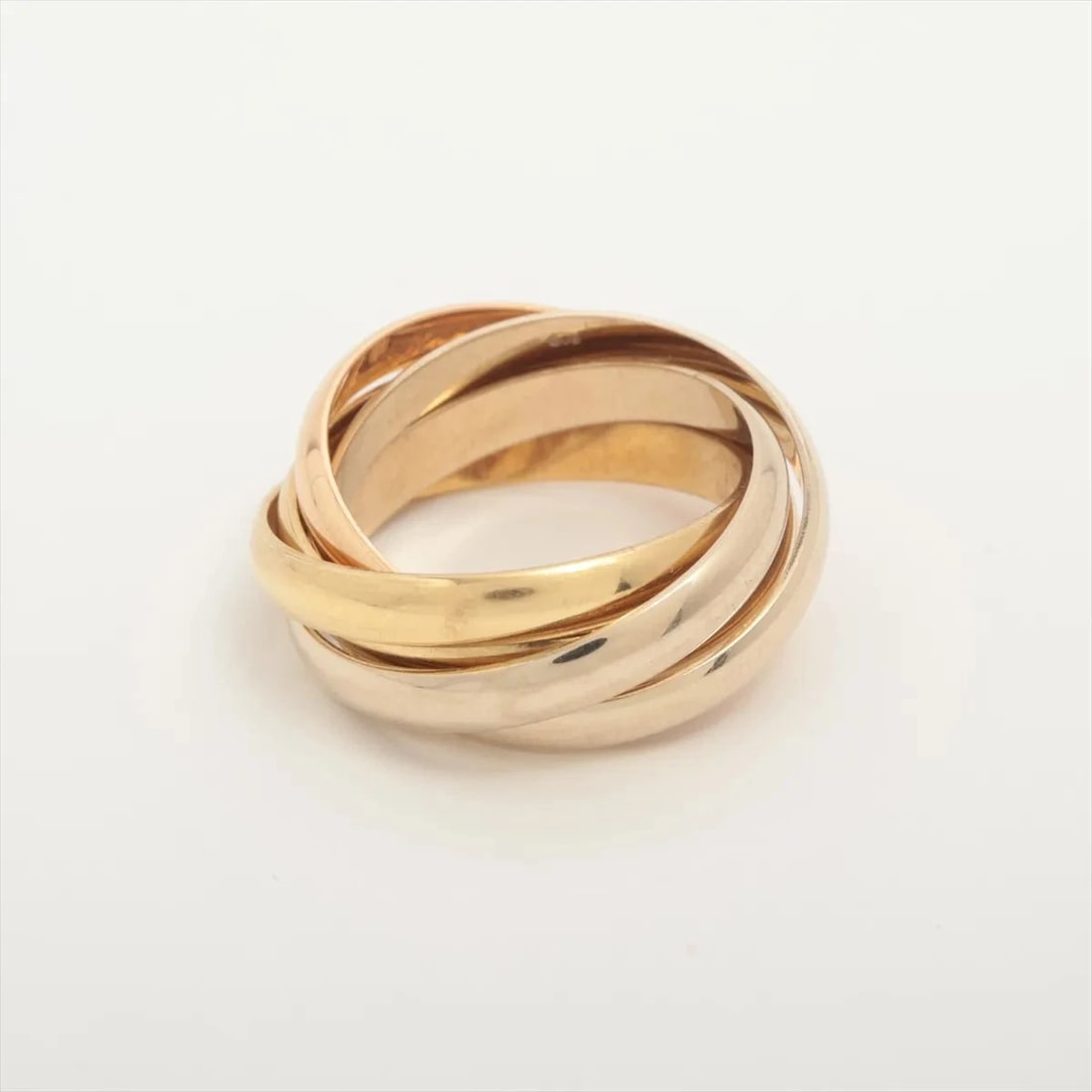 CARTIER TRINITY 5 ROWS RING 750(YG PG WG): Cartier Trinity 5 rows Ring 750(YG PG WG) Brand: Cartier Type/Style: Ring Material: 750(YG?PG?WG) Color: YG?PG?WG Size: 4.5 - 4.75 US Accessories: None Accessories Notice: When purchasing pre-owned