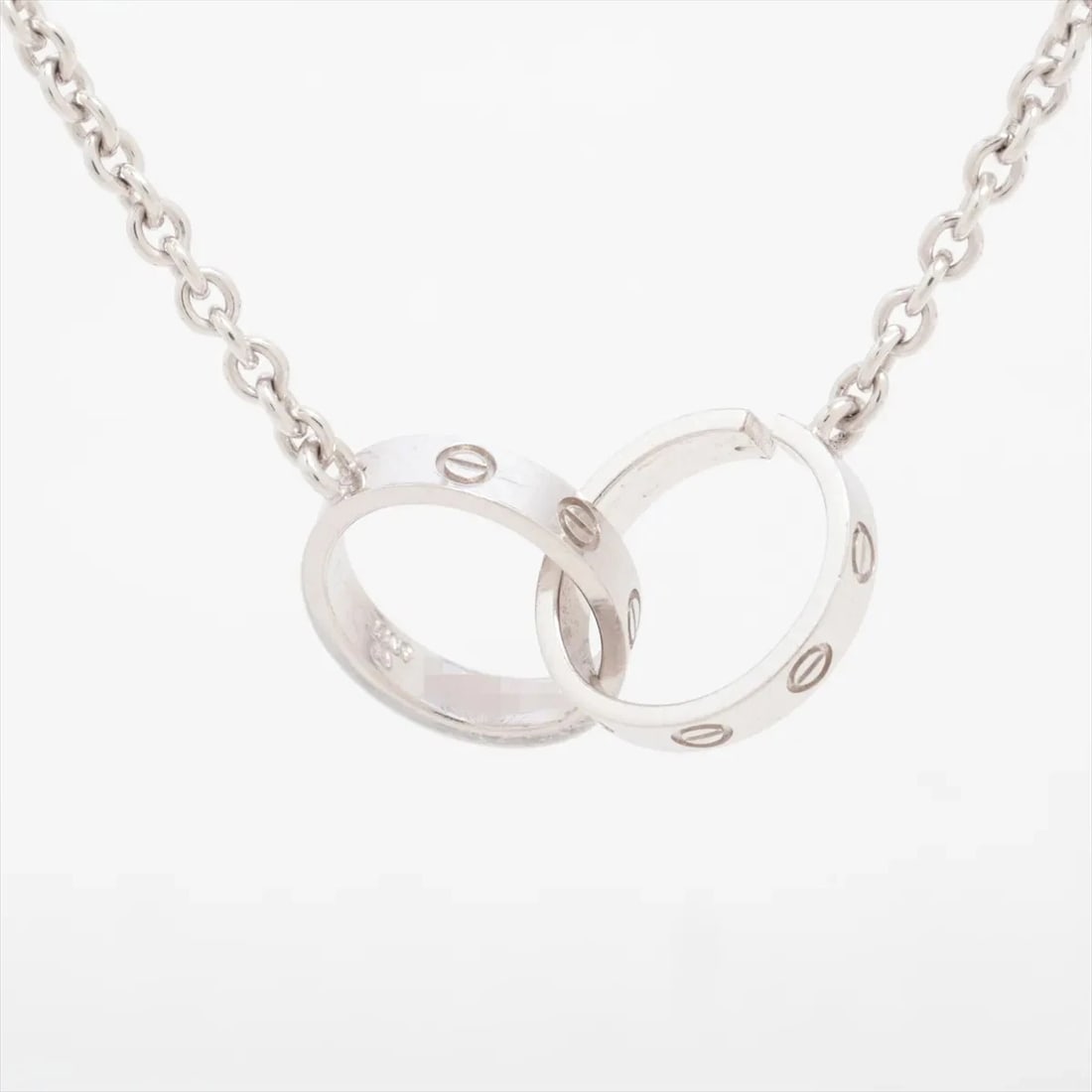 CARTIER BABY LOVE NECKLACE 750(WG): Cartier Baby Love Necklace 750(WG) Brand: Cartier Type/Style: Necklace Material: 750(WG) Color: White Gold Size: Chain length:43.2 Accessories: None Accessories Notice: When purchasing pre-owned