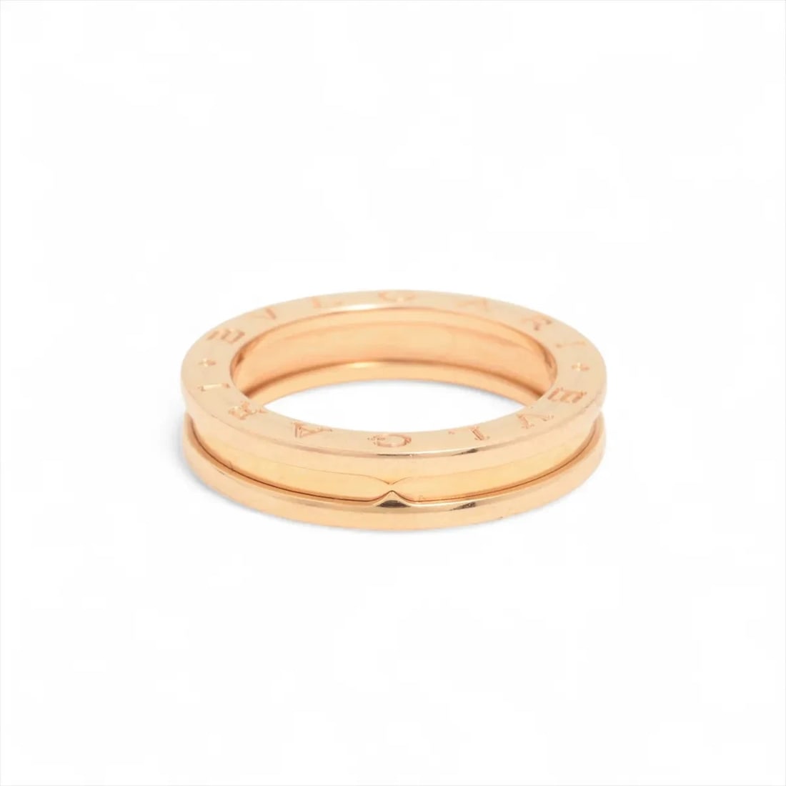 BVLGARI RING 750(PG): Bvlgari Ring 750(PG) Brand: Bvlgari Type/Style: Ring Material: 750(PG) Color: Pink Gold Size: 7 - 7.25 US Accessories: None Accessories Notice: When purchasing pre-owned goods, please refer to the