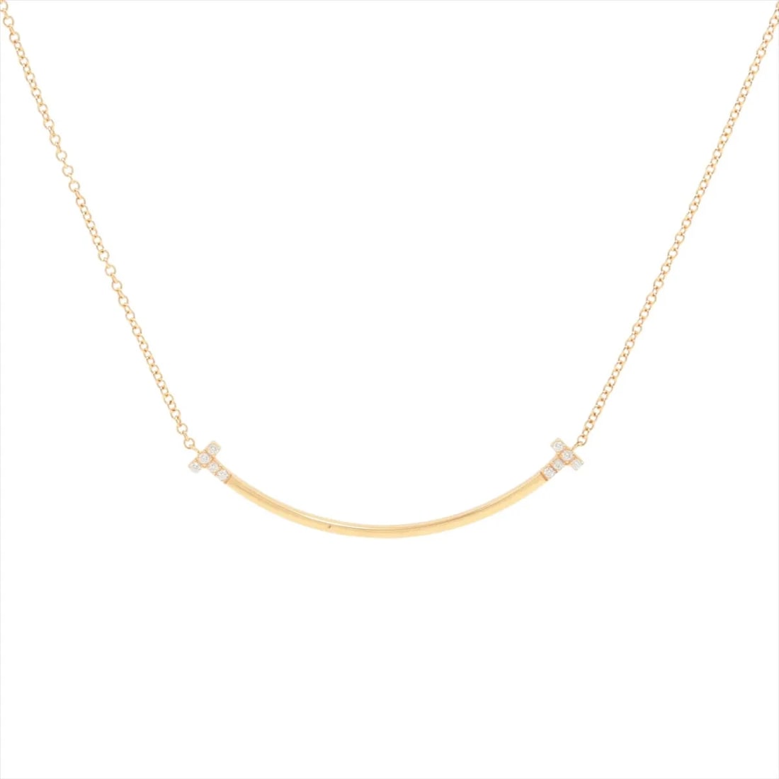 TIFFANY T SMILE SMALL DIAMOND NECKLACE 750(PG): Tiffany T Smile Small diamond Necklace 750(PG) Brand: Tiffany Type/Style: Necklace Material: 750(PG), Main Stone Natural Color: Pink Gold Size: Chain length:45.5cm Accessories: None Accessories