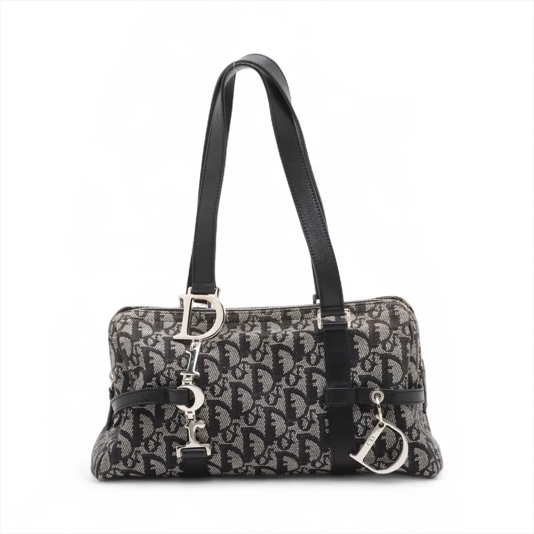 CHRISTIAN DIOR TROTTER CANVAS & LEATHER HAND BAG BLACK: Christian Dior Trotter Canvas & Leather Hand bag Black Brand: Christian Dior Type/Style: Hand bag Material: Canvas & Leather Color: Black Size: Height:5.7inchLength:11.2inchDepth:5.1inch Accessories: