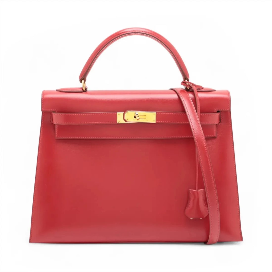 HERMES KELLY 32 SERIE BOX CALF ROUGE VIF GOLD METAL: Hermes Kelly 32 Serie Box calf Rouge vif Gold Metal Brand: Hermes Type/Style: Hand bag Material: Box calf Color: Rouge vif Size: Height:8.9inchLength:13.0inchDepth:4.5inch Accessories: None