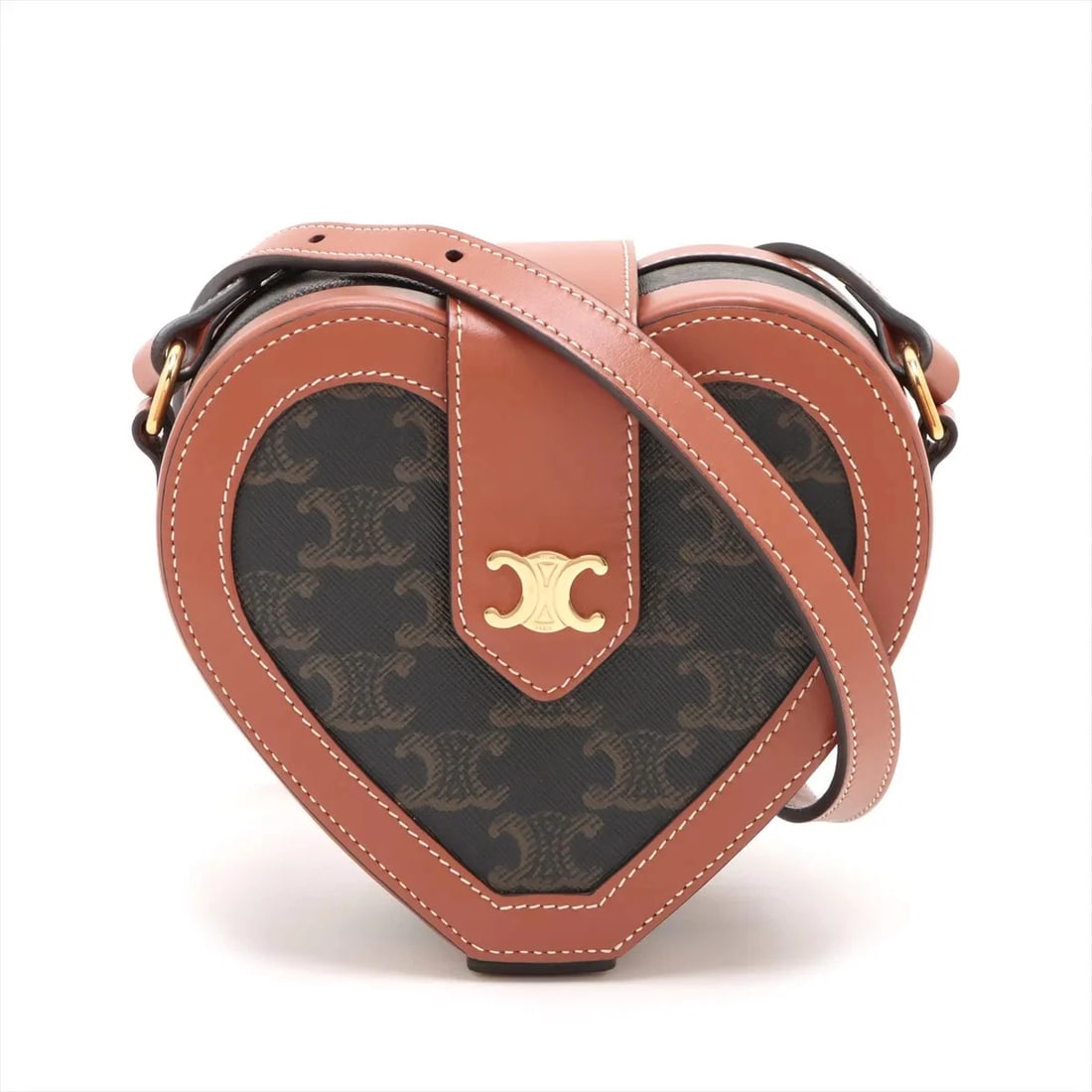 CELINE TRIOMPHE HEARTS PVC & LEATHER SHOULDER BAG BROWN: Celine Triomphe hearts PVC & leather Shoulder bag Brown Brand: Celine Type/Style: Shoulder bag Material: PVC & leather Color: Brown Size: Height:5.5inchLength:6.1inchDepth:3.0inch Accessories: Non