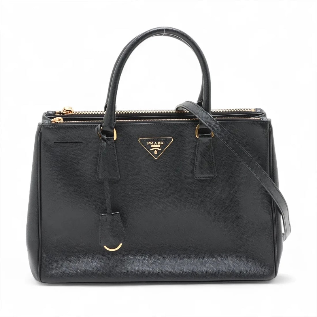 PRADA SAFFIANO LEATHER 2 WAY HANDBAG BLACK: Prada Saffiano Leather 2 Way Handbag Black Brand: Prada Type/Style: Hand bag Material: Leather Color: Black Size: Height:9.1inchLength:13.4inchDepth:5.9inch Accessories: None Accessories N