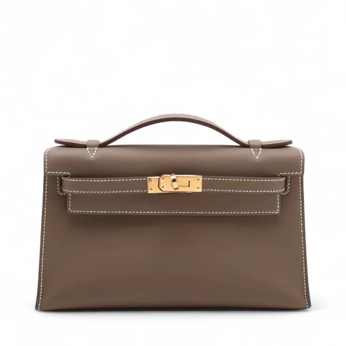 HERMES POCHETTE KELLY MINI VEAU SWIFT ETOUPE GOLD METAL: Hermes Pochette Kelly Mini Veau Swift Etoupe Gold Metal Brand: Hermes Type/Style: Hand bag Material: Veau Swift Color: Etoupe Size: Height:4.9inchLength:8.7inchDepth:2.8inch Accessories: None