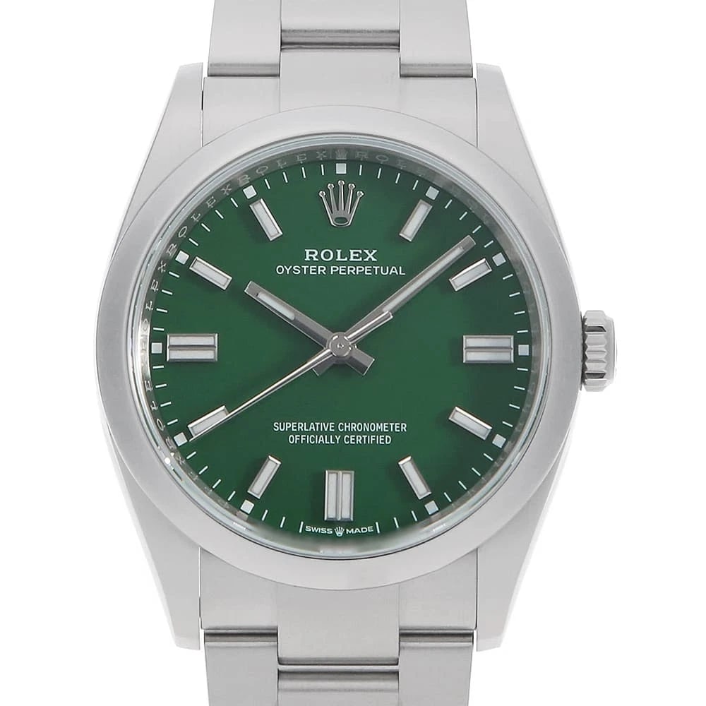ROLEX OYSTER PERPETUAL GREEN WATCH: ROLEX Oyster Perpetual green Watch Brand: ROLEX Type/Style: Wrist watch Material: Band Material Stainless Steel, Case Material Stainless Steel Color: Dial Color Green Size: Case:W36mm Circumference of