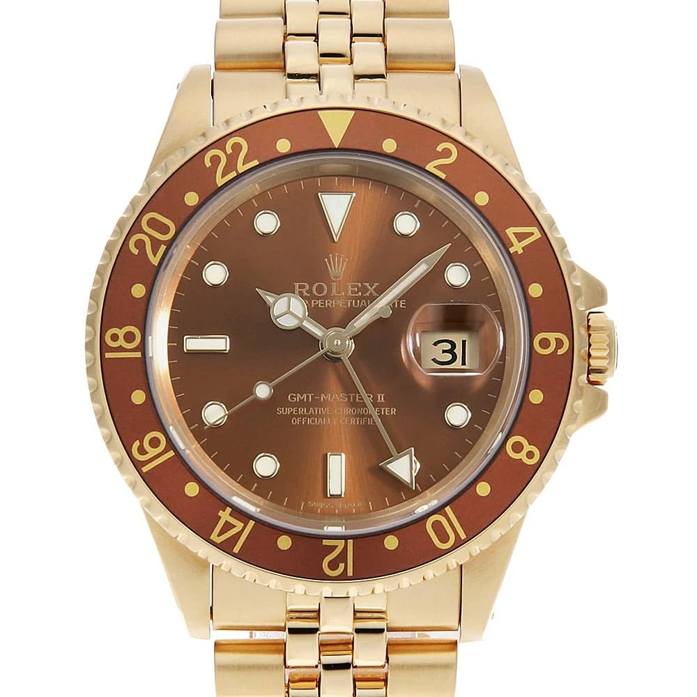 ROLEX GMT MASTER BROWN JUBILEE WATCH: ROLEX GMT Master Brown jubilee Watch Brand: ROLEX Type/Style: Wrist watch Material: Band Material Yellow Gold, Case Material Yellow Gold Color: Dial Color Brown Size: Case:W40mm Circumference of