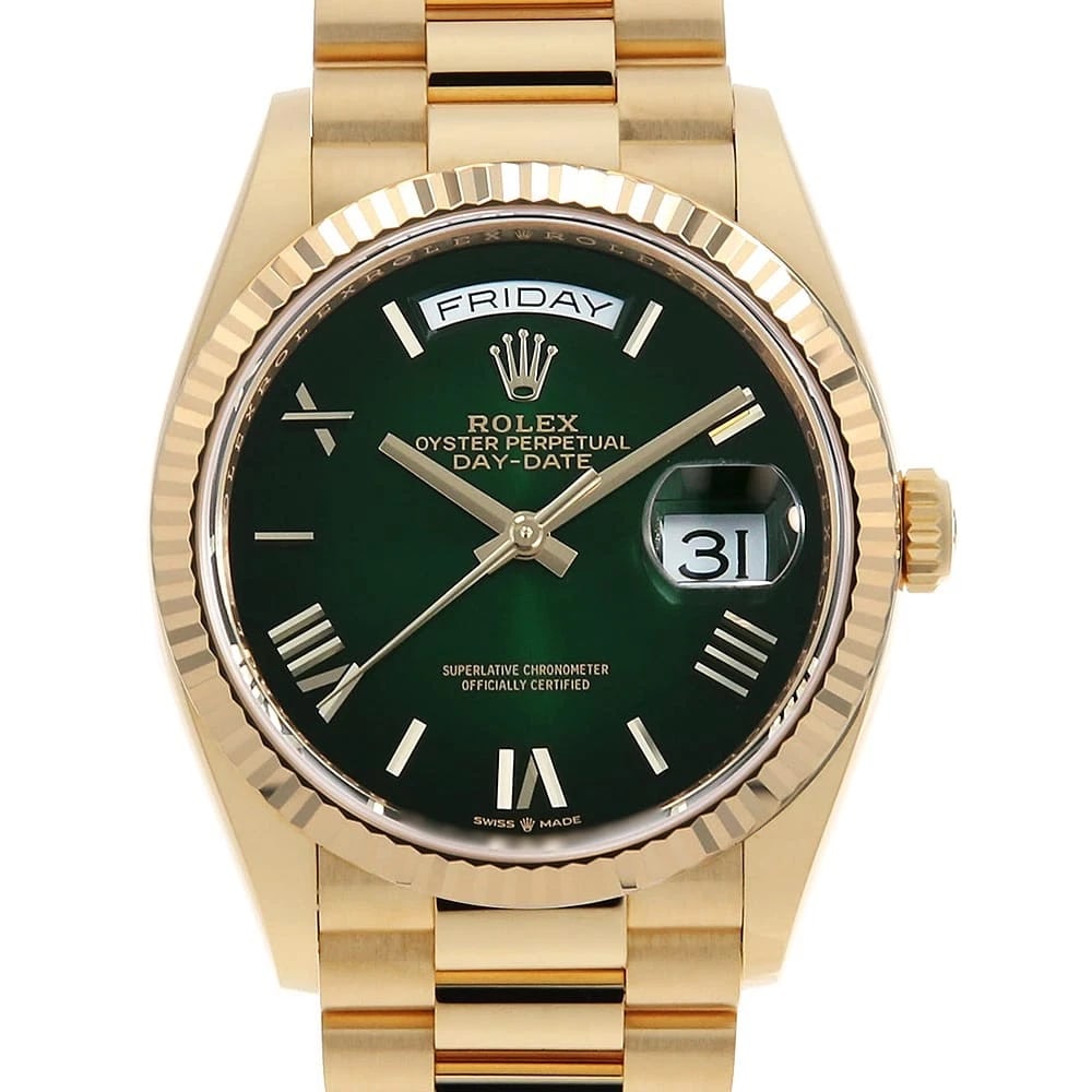 ROLEX DAY-DATE GREEN OMBRE ROMAN WATCH: ROLEX Day-Date green Ombre Roman Watch Brand: ROLEX Type/Style: Wrist watch Material: Band Material Yellow Gold, Case Material Yellow Gold Color: Dial Color Green Size: Case:W36mm Circumference of Wri