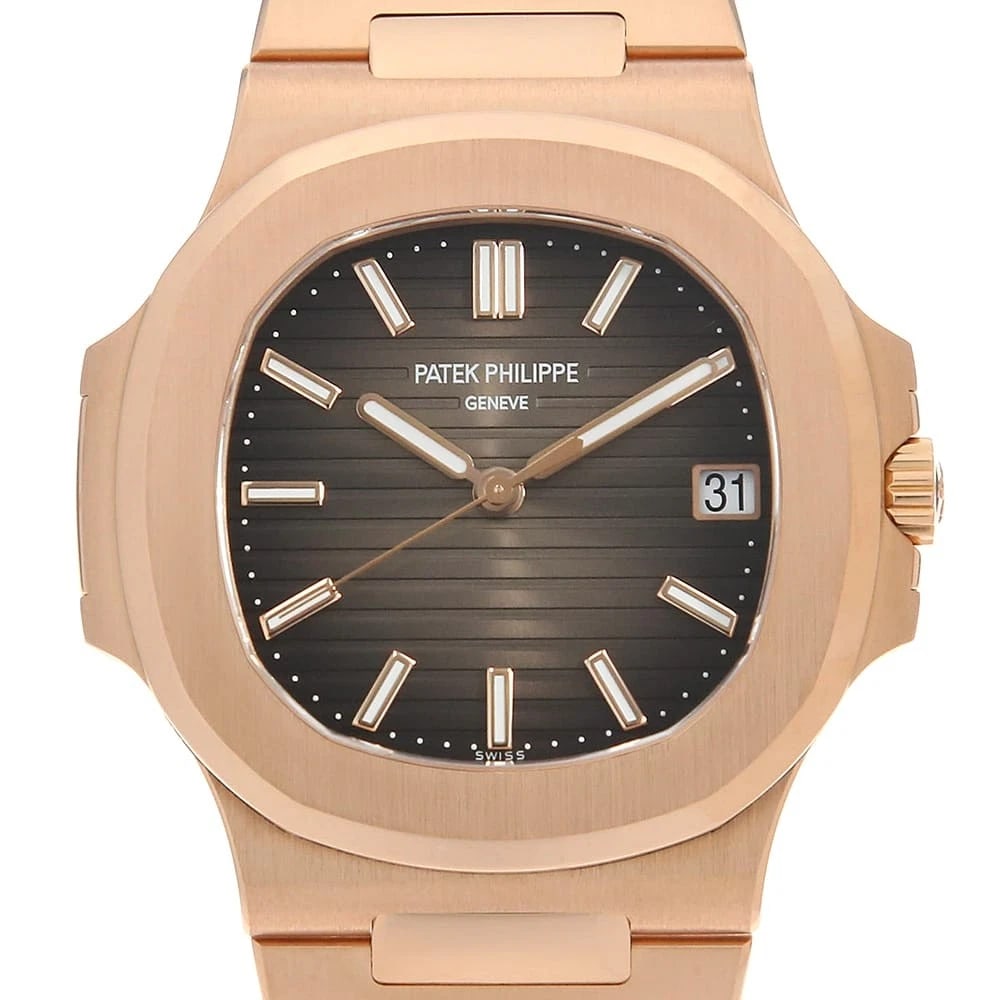PATEK PHILIPPE NAUTILUS WATCH: PATEK PHILIPPE Nautilus Watch Brand: PATEK PHILIPPE Type/Style: Wrist watch Material: Band Material Rose Gold, Case Material Rose Gold Color: Dial Color Brown Size: Case:W38mm x H43mm Circumference