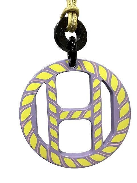 HERMES NECKLACE BUFFALO HORN PURPLE: Hermes Necklace Buffalo Horn Purple Brand: Hermes Type/Style: Necklace Material: Leather Buffalo Horn Color: Purple Size: Chain approximately 30 inches, Top approximately 2.6 inches x 2.6 inches A