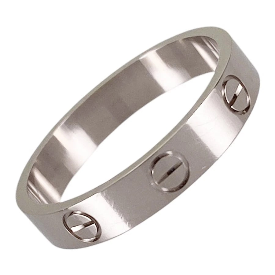 CARTIER MINI LOVE WHITE GOLD RING: Cartier Mini Love White gold Ring Brand: Cartier Type/Style: Ring Material: 18K White Gold Color: Silver Size: 7-7.5 US Accessories: None Accessories Notice: When purchasing pre-owned good