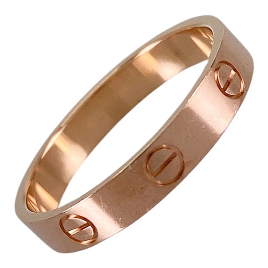 CARTIER MINI LOVE ROSE GOLD RING: Cartier Mini Love Rose gold Ring Brand: Cartier Type/Style: Ring Material: 18K Rose Gold Color: Gold Size: 9-9.5 US Accessories: None Accessories Notice: When purchasing pre-owned goods, p