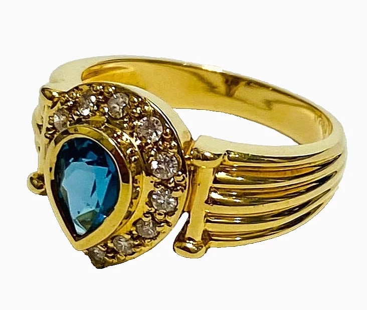 BLUE TOPAZ PEAR SHAPE DIAMOND 18K YELLOW GOLD RING: Blue Topaz Pear Shape Diamond 18k Yellow Gold Ring Brand: Unbranded Type/Style: Ring Material: 18k Yellow Gold, Main Stone Natural Color: Yellow Size: US6.5 Accessories: None Accessories N