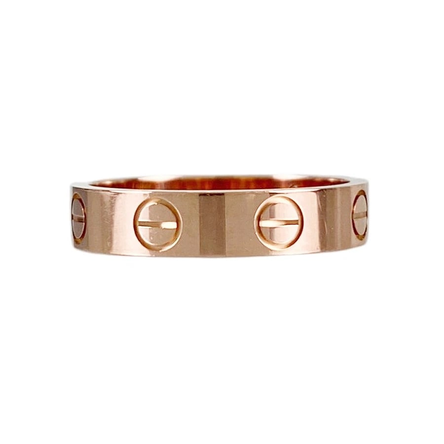 CARTIER MINI LOVE ROSE GOLD RING: Cartier Mini Love Rose gold Ring Brand: Cartier Type/Style: Ring Material: 18K Rose Gold, Color: Rose Gold Size: 4.5 US Accessories: None Accessories Notice: When purchasing pre-owned good