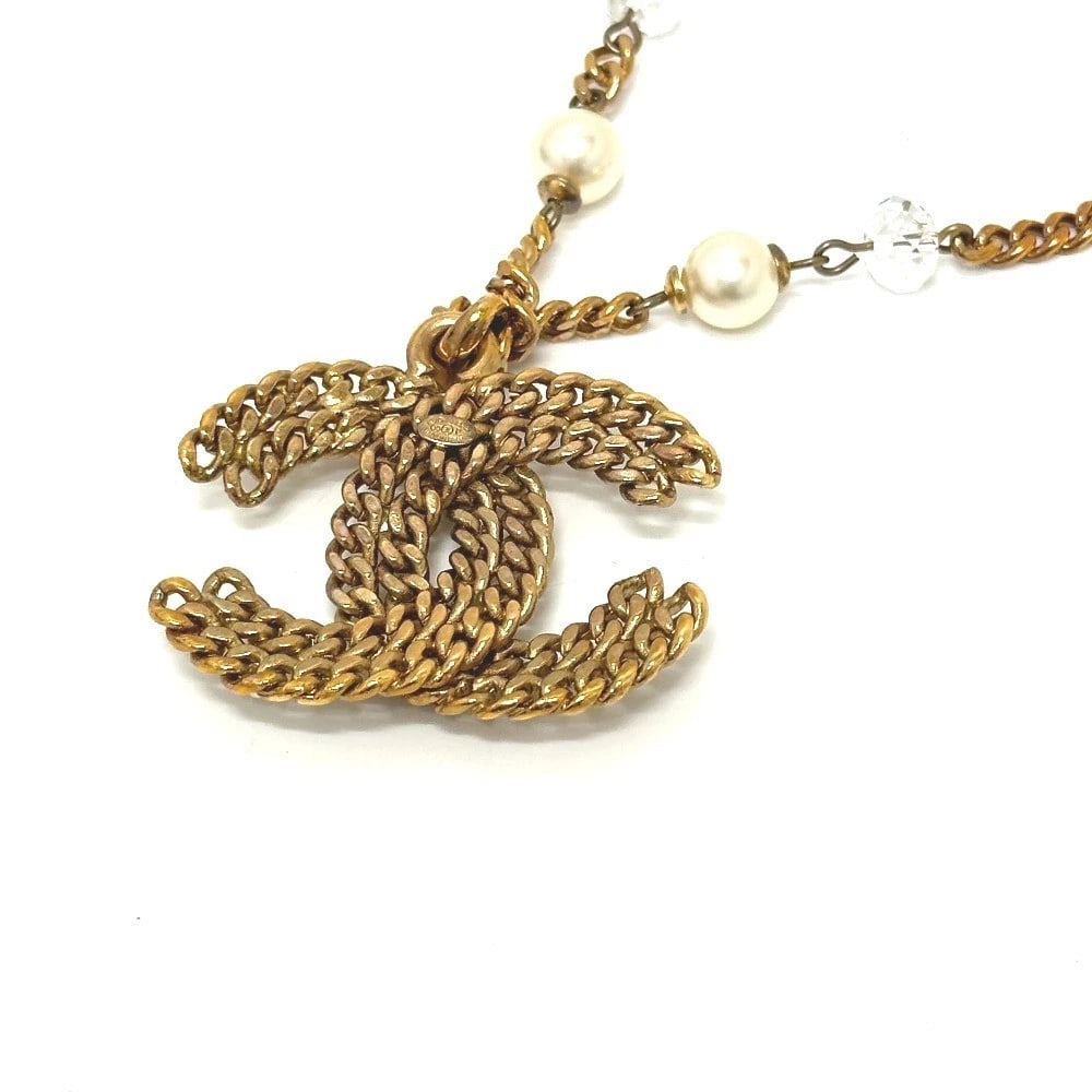 CHANEL 05P COCO MARK PEARL CHAIN NECKLACE GOLD: CHANEL 05P Coco Mark Pearl Chain Necklace Gold Brand: CHANEL Type/Style: Necklace Material: Metal, Color: GOLD Size: Total Length: 19 cm Top W43mm x H40mm Accessories: None Accessories Not