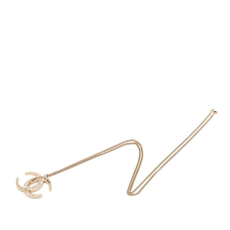CHANEL NECKLACE COCO MARK GOLD PLATED RHINESTONES: Chanel Necklace Coco Mark Gold Plated Rhinestones Brand: Chanel Type/Style: Necklace Material: Plated/Rhinestone, Color: GOLD Size: Total Length: Approx. 90cm Top: Approx. W50.6mm x H37.1mm Access