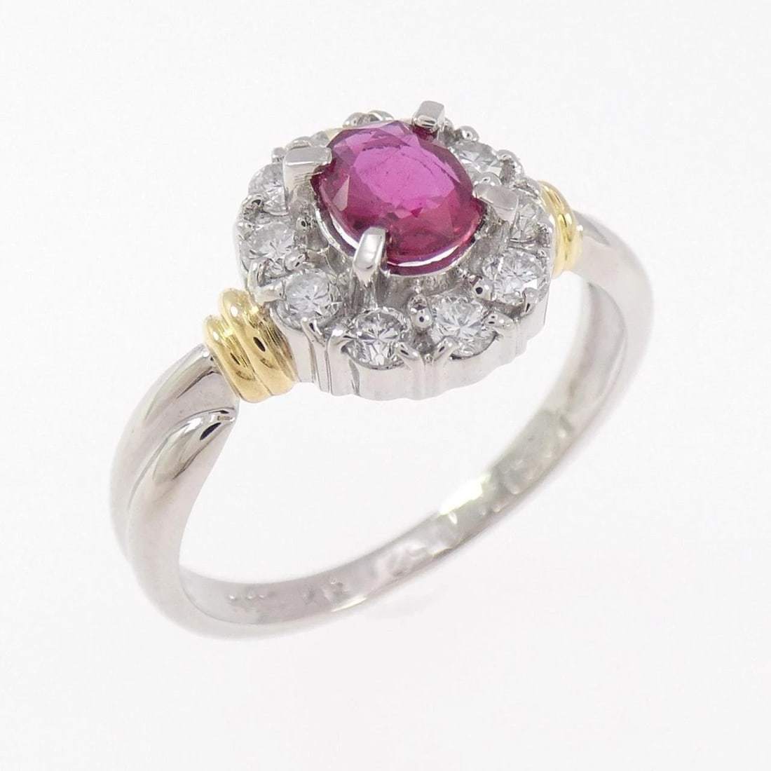 PT900/K18YG RUBY RING: PT900/K18YG Ruby Ring Brand: Unbranded Type/Style: Ruby Ring Material: Platinum90018K Yellow Gold, Main Stone/Creation RubySecondary Stone Diamond Color: Yellow Gold Platinum Size: US 6 Accessorie