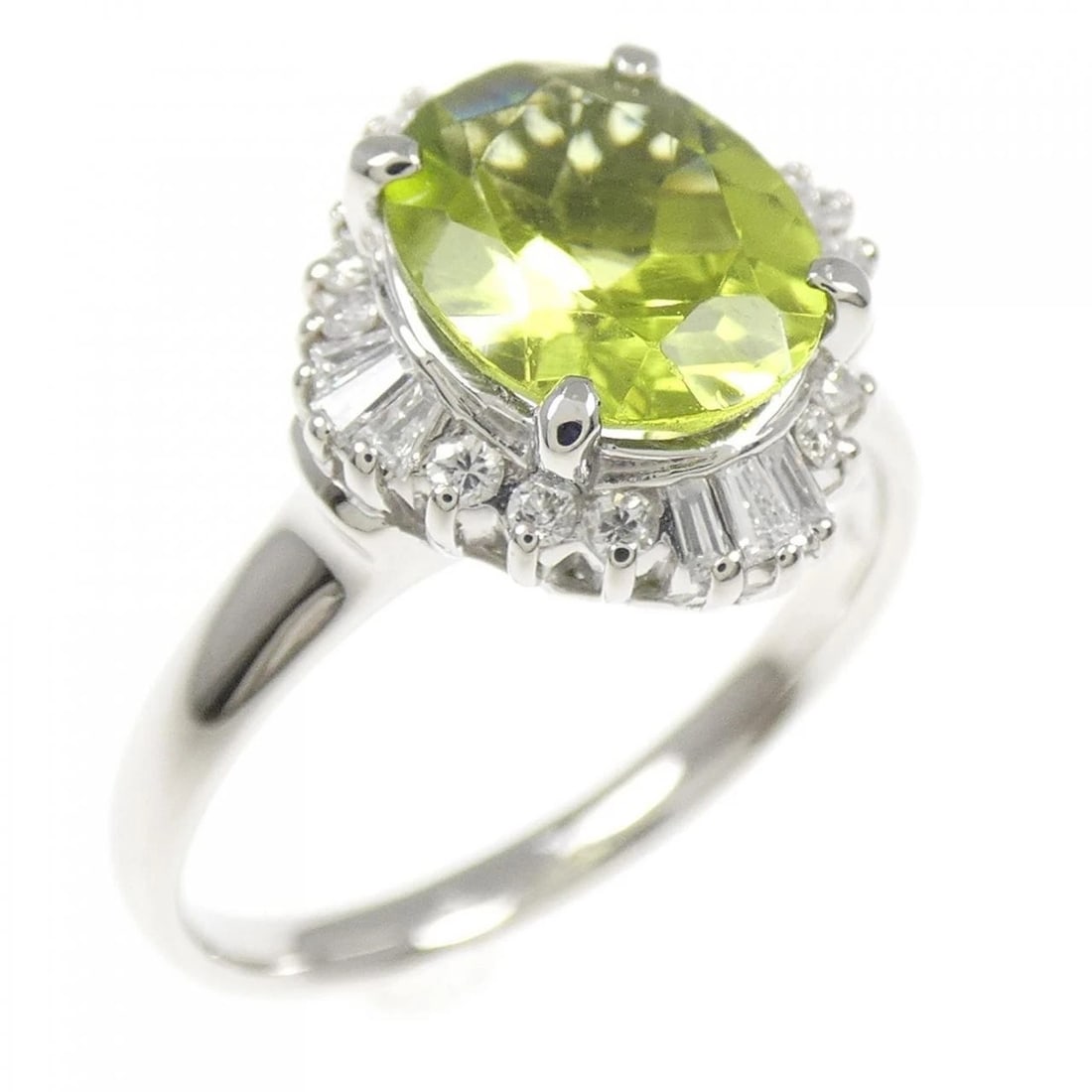 PT900 PERIDOT RING: PT900 Peridot Ring Brand: Unbranded Type/Style: Peridot Ring Material: Platinum900, Main Stone/Creation Peridot Secondary Stone Diamond Color: Platinum Size: US 7 Accessories: None Accessories