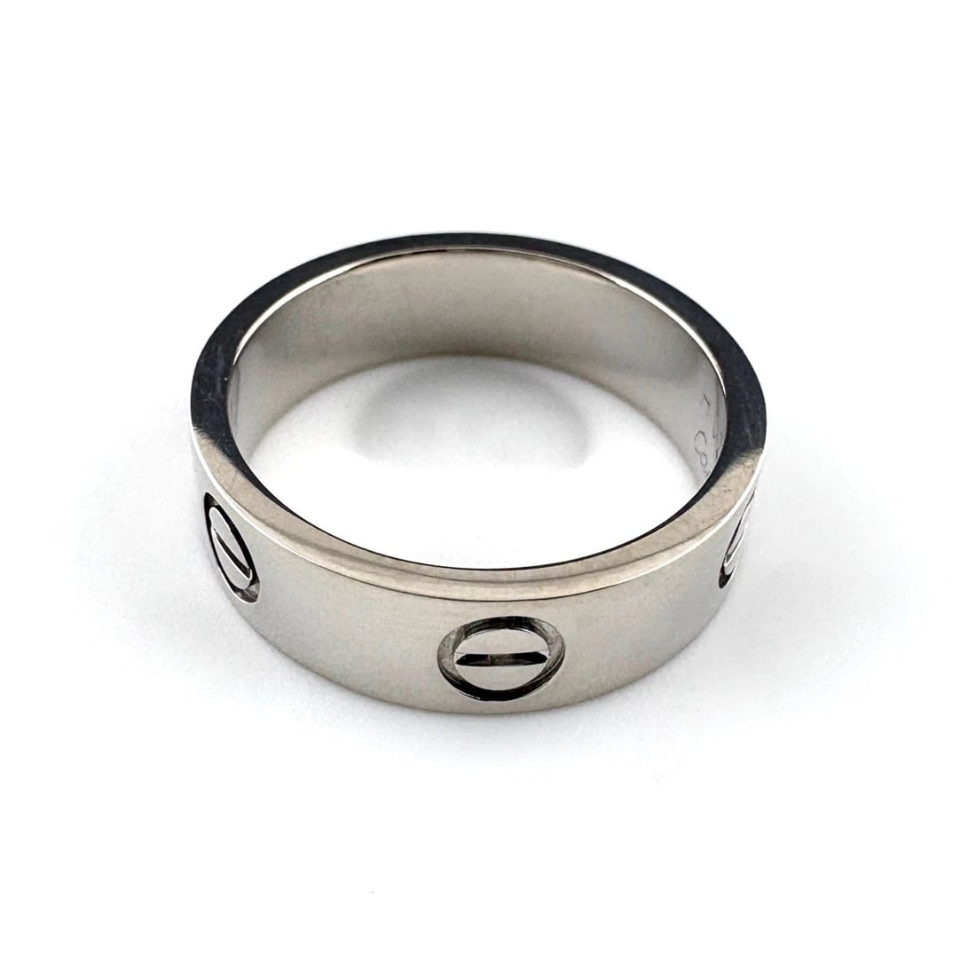 CARTIER LOVE RING: CARTIER Love Ring Brand: CARTIER Type/Style: Ring Material: 750 Color: None Size: US 7 to 7.5 Accessories: None Accessories Notice: When purchasing pre-owned goods, please refer to the photos of the