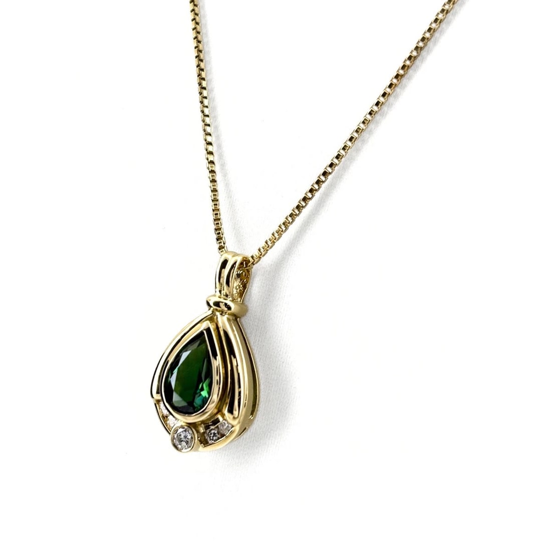 TOURMALINE DESIGN NECKLACE: Tourmaline Design Necklace Brand: Unbranded Type/Style: Necklace Material: 18K YG Main Stone Tourmaline Color: YG Size: Chain / code 45cm(17.7") Pendant size 22.1?11.7mm(0.9") Accessories: None
