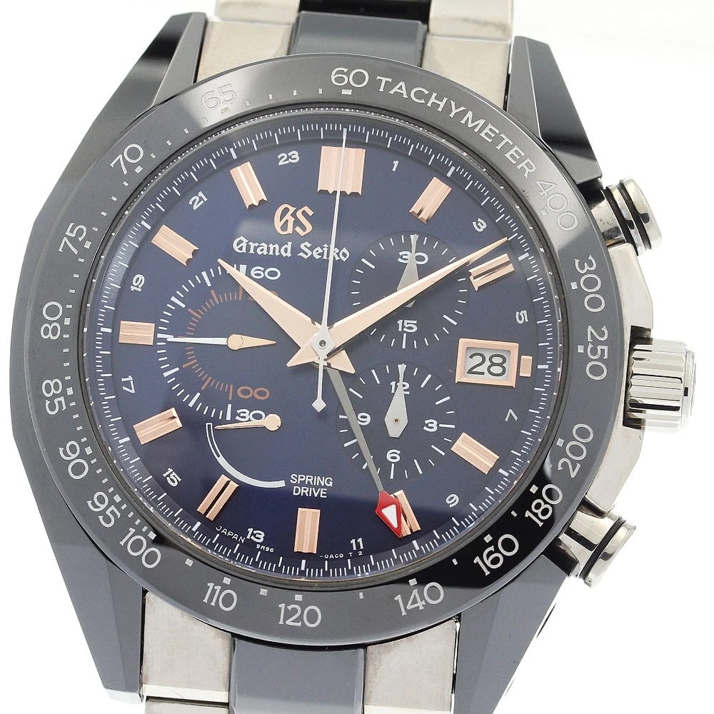 SEIKO GRAND TITANIUM WATCH: SEIKO Grand Titanium Watch Brand: SEIKO Type/Style: Wristwatch Material: Band Material Titanium / ceramic, Case Material Titanium / ceramic Color: Dial Color Navy Band Color Silver / Black Case Color