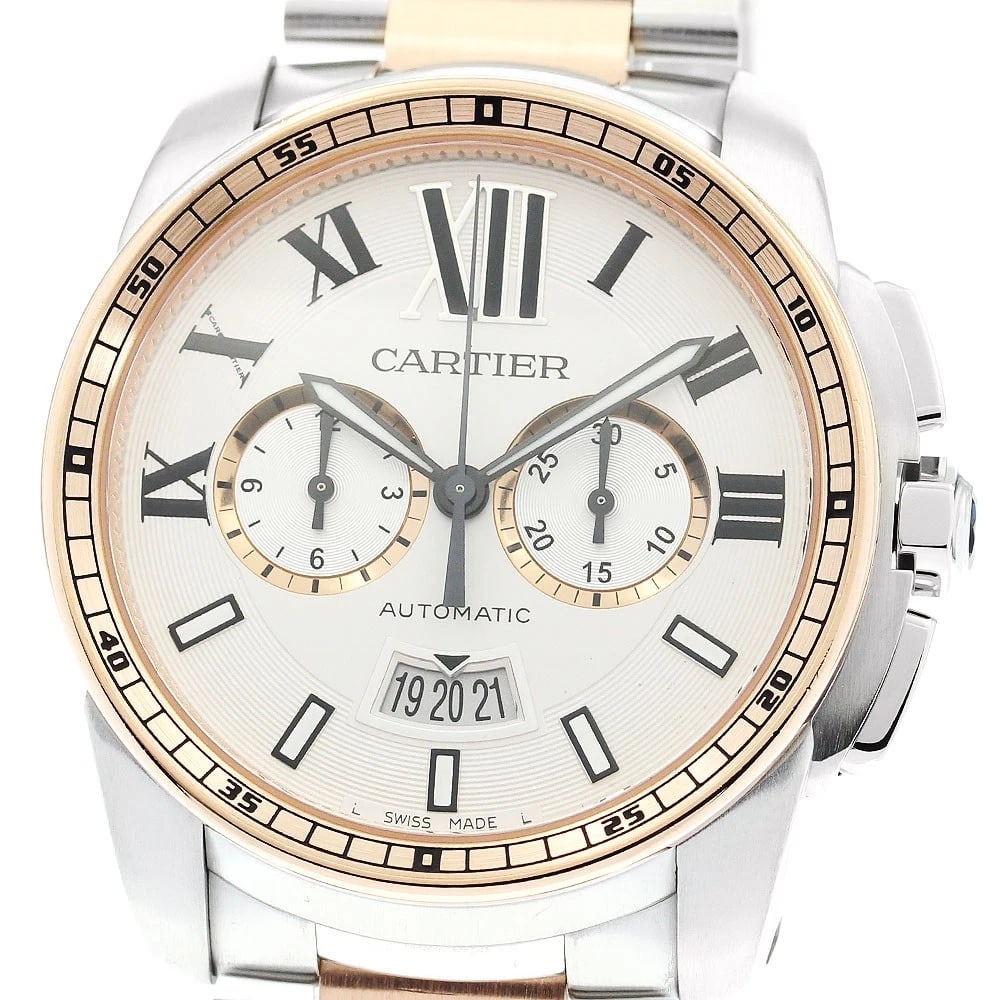 CARTIER CALIBRE DATE CHRONOGRAPH WATCH: CARTIER Calibre date Chronograph Watch Brand: CARTIER Type/Style: Wristwatch Material: Band Material Stainless Steel/K18PG, Case Material Stainless Steel/K18PG Color: Dial Color Silver Band Color