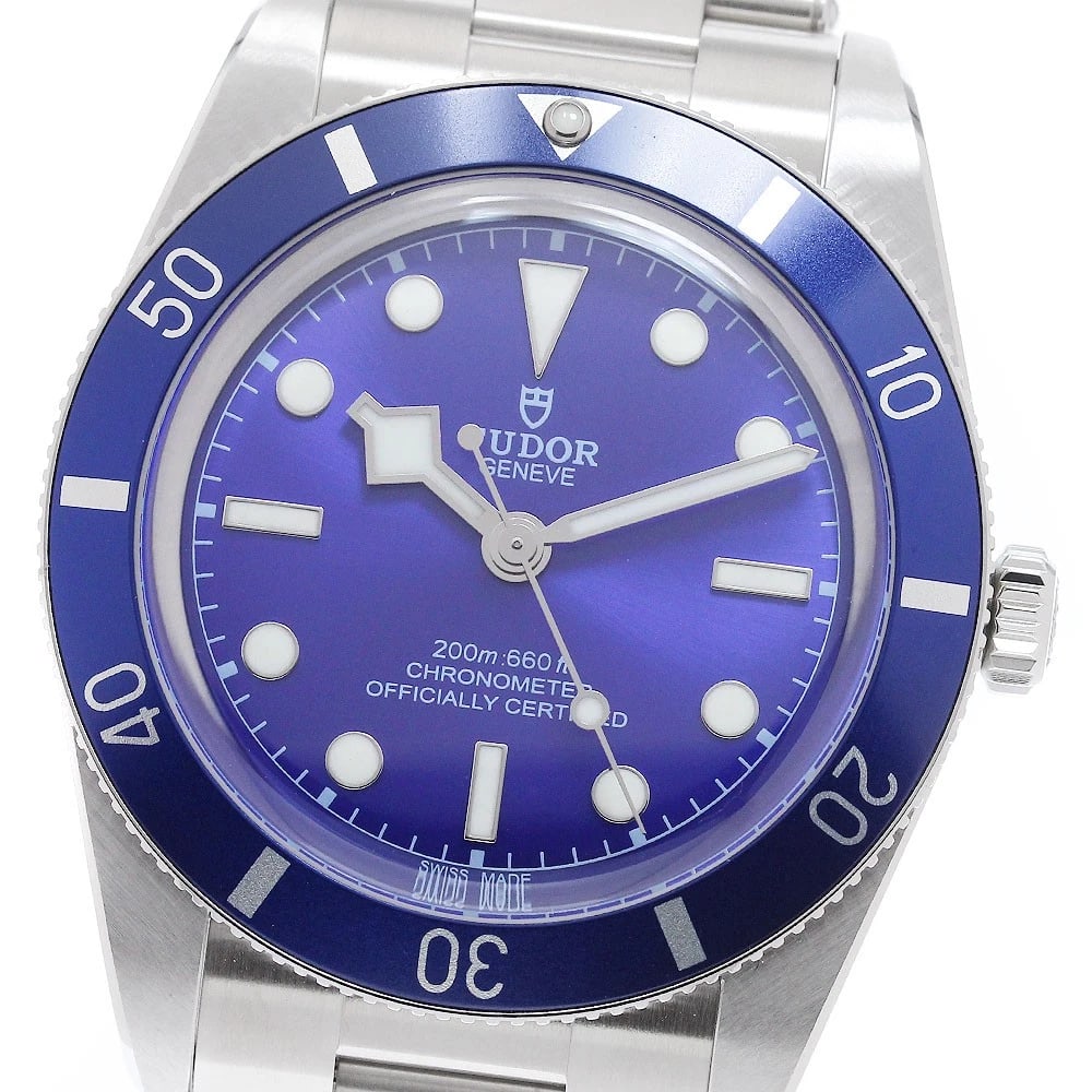 TUDOR BLACK BLUE AUTOMATIC WATCH: TUDOR black blue Automatic Watch Brand: TUDOR Type/Style: Wristwatch Material: Band Material Stainless Steel, Case Material Stainless Steel Color: Case Color Silver Band Color Silver Dial Color blue