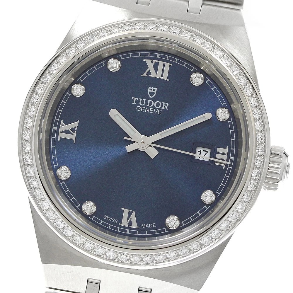 TUDOR ROYAL DIAMOND BEZEL DATE BLUE AUTOMATIC WATCH: TUDOR Royal Diamond Bezel Date Blue Automatic Watch Brand: TUDOR Type/Style: Wristwatch Material: Band Material Stainless Steel, Case Material Stainless Steel Color: Case Color Silver Band Color
