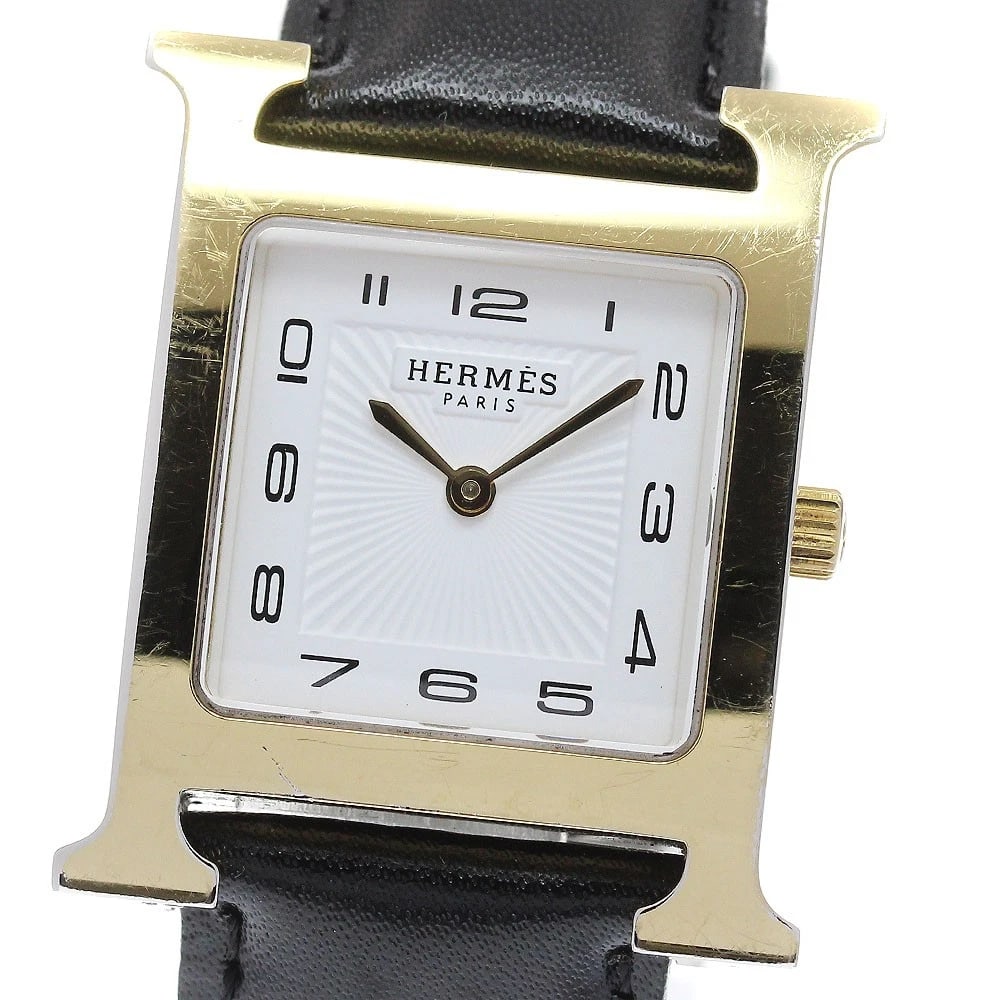 HERMES WATCH WHITE QUARTZ WATCH: HERMES watch white Quartz Watch Brand: HERMES Type/Style: Wristwatch Material: Band Material leather, Case Material Stainless Steel/Gold Plated Color: Dial Color white Band Color black Case Color