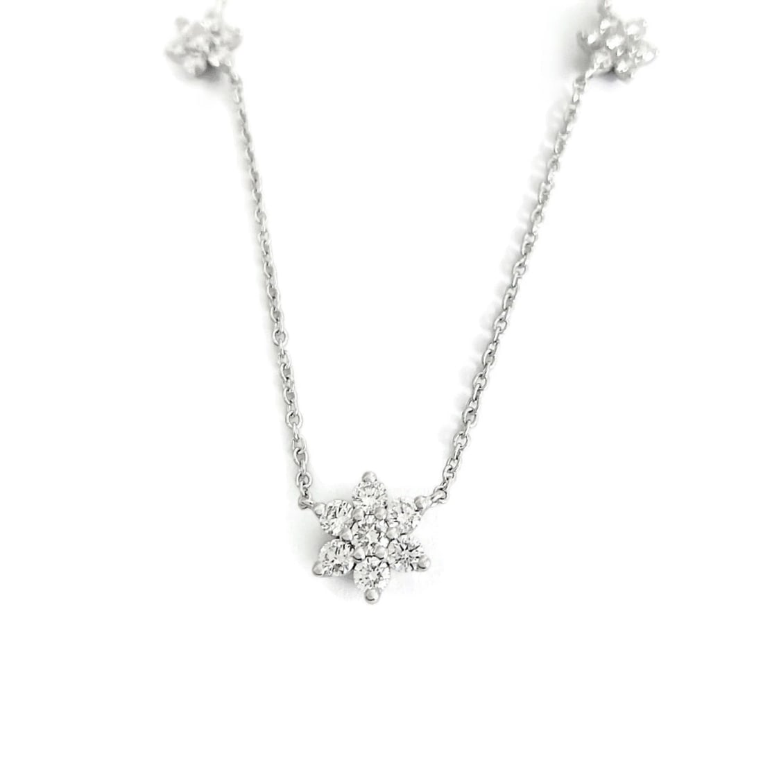 STAR FLOWER DIAMOND CLUSTER STATION NECKLACE 14K WHITE GOLD: Star Flower Diamond Cluster Station Necklace 14K White Gold Brand: Unbranded Type/Style: Necklace Material: 14K White Gold, Main Stone Natural Color: Silver Size: Length: 17 inches Width: 9.8 mm at