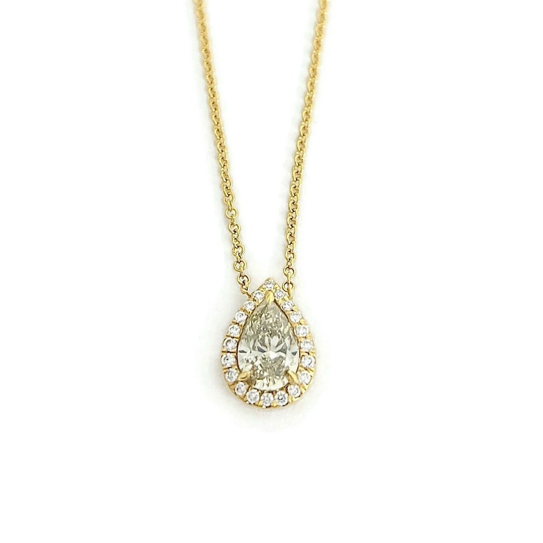 FANCY YELLOW DIAMOND TEARDROP HALO PENDANT NECKLACE: Fancy Yellow Diamond Teardrop Halo Pendant Necklace Brand: Unbranded Type/Style: Necklace Material: 14K Yellow Gold, Main Stone Natural Color: Gold Size: Length: 16 inches Pendant: 10.3 mm x 7.4 mm