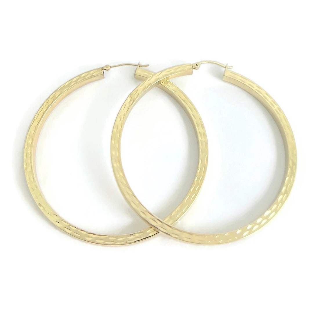 TEXTURED BIG HOOP EARRINGS 14K YELLOW GOLD: Textured Big Hoop Earrings 14K Yellow Gold Brand: Estate Type/Style: Earrings Material: 14K Yellow Gold, Color: Gold Size: Length: 2.5 inches Width: 3.2 mm Accessories: None Accessories Notice: When