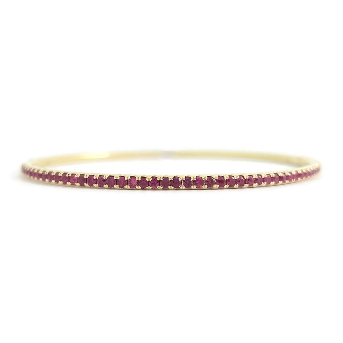 THIN RUBY GEMSTONE BANGLE BRACELET 14K YELLOW GOLD: Thin Ruby Gemstone Bangle Bracelet 14K Yellow Gold Brand: none Type/Style: Bracelet Material: 14K Yellow Gold, Main Stone Natural Color: Red Size: Length: 6.5 inches Width: 2.4 mm Accessories: Non