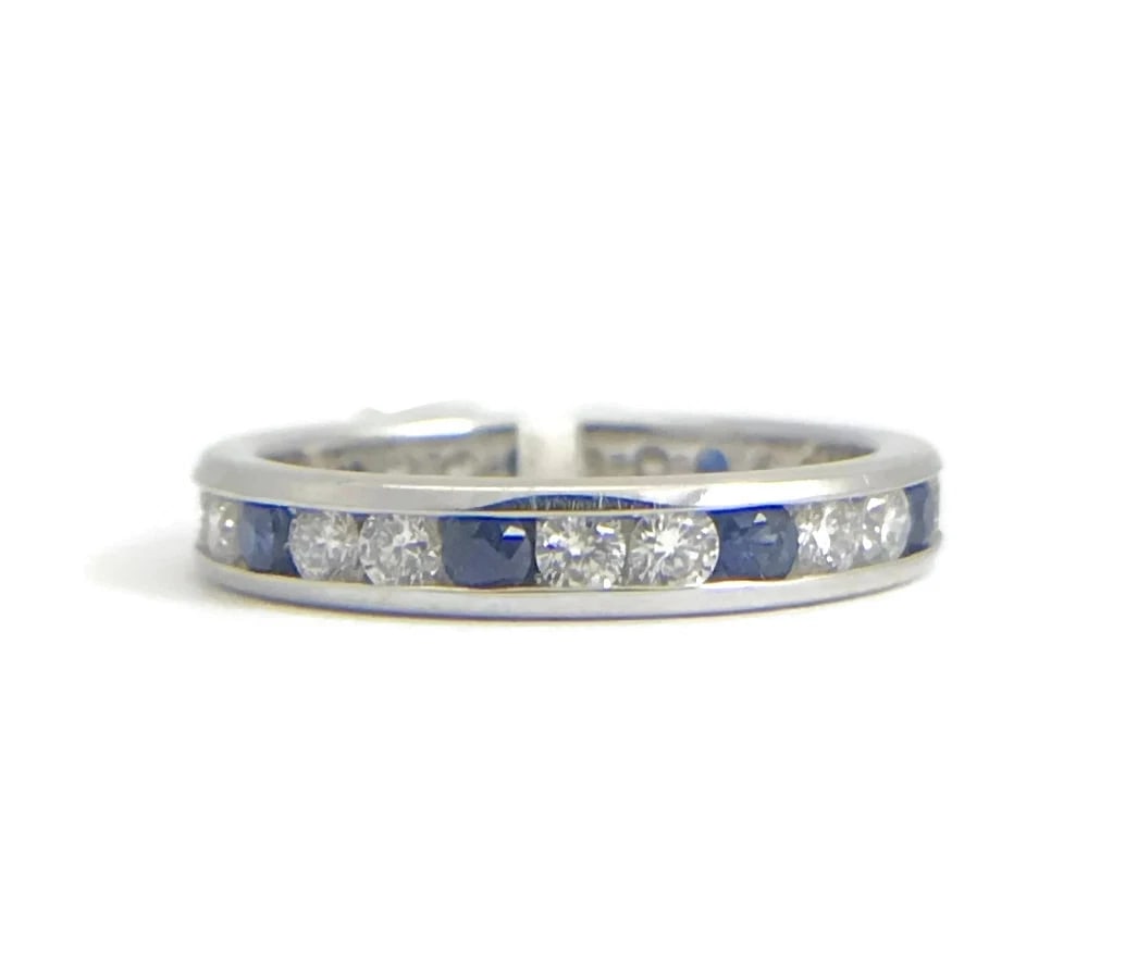 BLUE SAPPHIRE AND DIAMOND ETERNITY BAND RING 14K WHITE GOLD: Blue Sapphire and Diamond Eternity Band Ring 14K White Gold Brand: Unbranded Type/Style: Ring Material: 14K White Gold, Main Stone Natural Color: Blue Size: 4 US Accessories: None Accessor