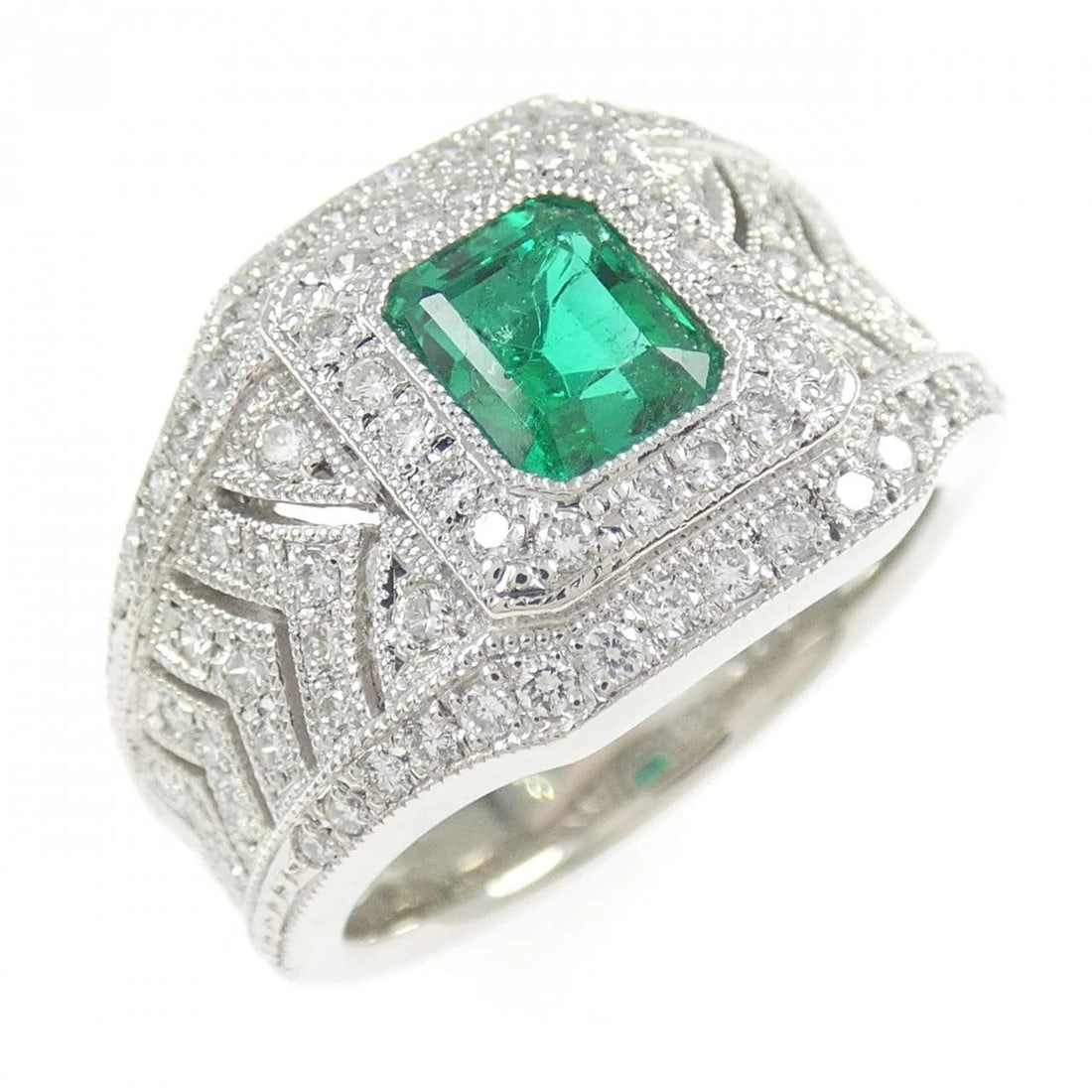 PT900 EMERALD RING: PT900 Emerald Ring Brand: Unbranded Type/Style: Emerald Ring Material: PT900, Main Stone EmeraldSecondary Stone Diamond Color: Silver Size: US 6 1/4 Accessories: None Accessories Notice: W