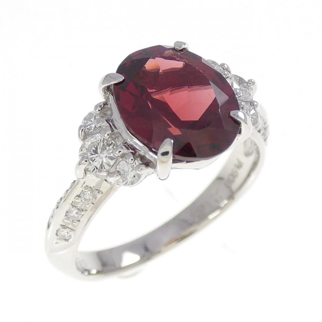 PT900 GARNET RING: PT900 Garnet Ring Brand: Unbranded Type/Style: Garnet Ring Material: Platinum900, Main Stone Garnet Secondary Stone Diamond Color: Platinum Size: US 6 1/2 Accessories: None Accessories Notice: When