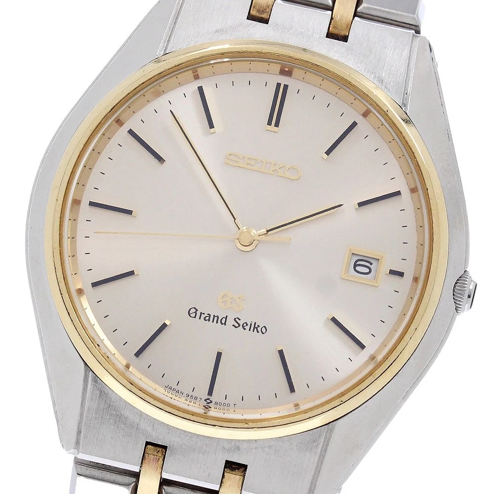 SEIKO GRAND DATE CHAMPAGNE GOLD QUARTZ WATCH: SEIKO Grand Date Champagne Gold Quartz Watch Brand: SEIKO Type/Style: Wristwatch Material: Band Material Stainless Steel/K18YG, Case Material Stainless Steel/K18YG Color: Case Color Silver / Gold