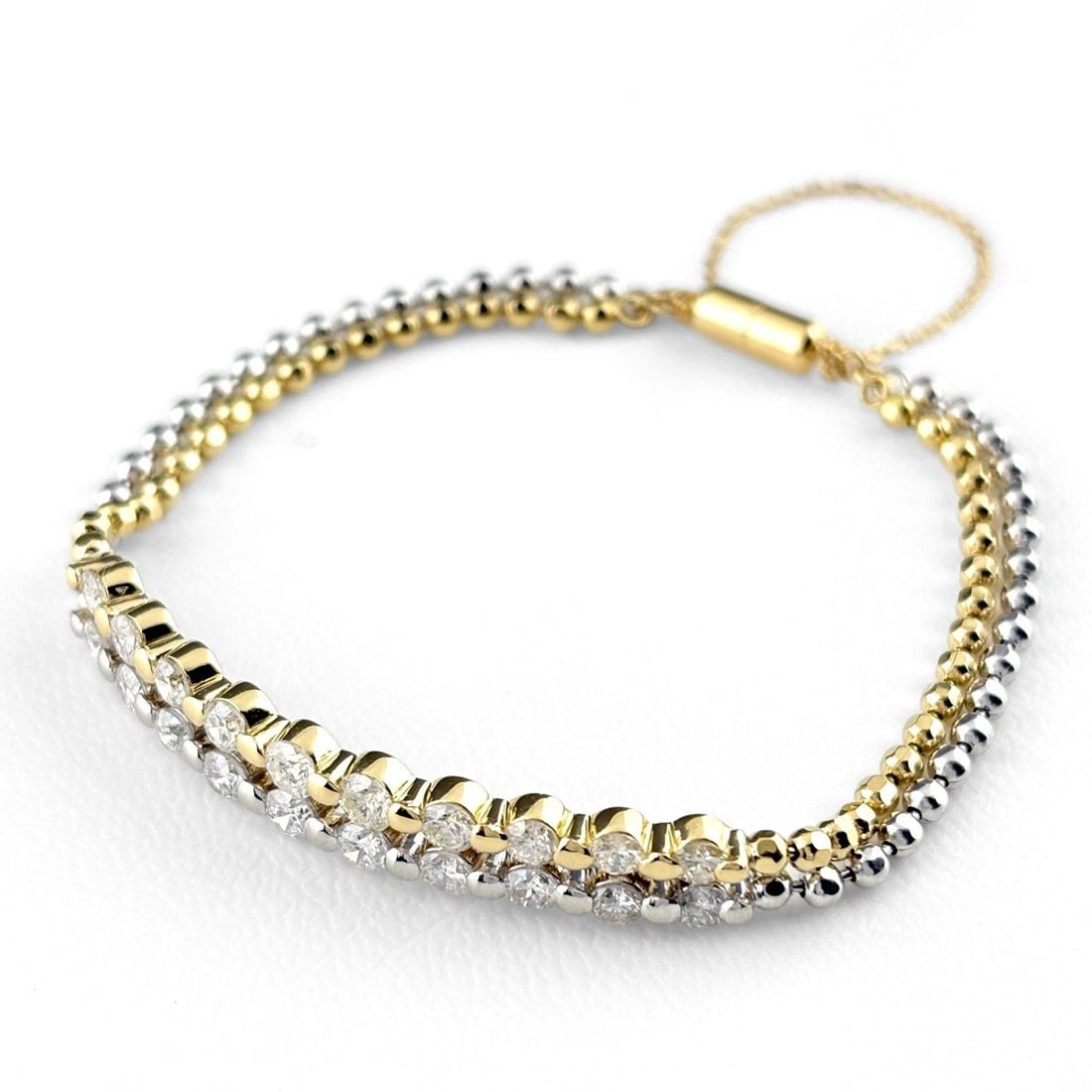 MELEE DIAMOND DESIGN YELLOWGOLD PLATINUM BRACELET (1 of 4)