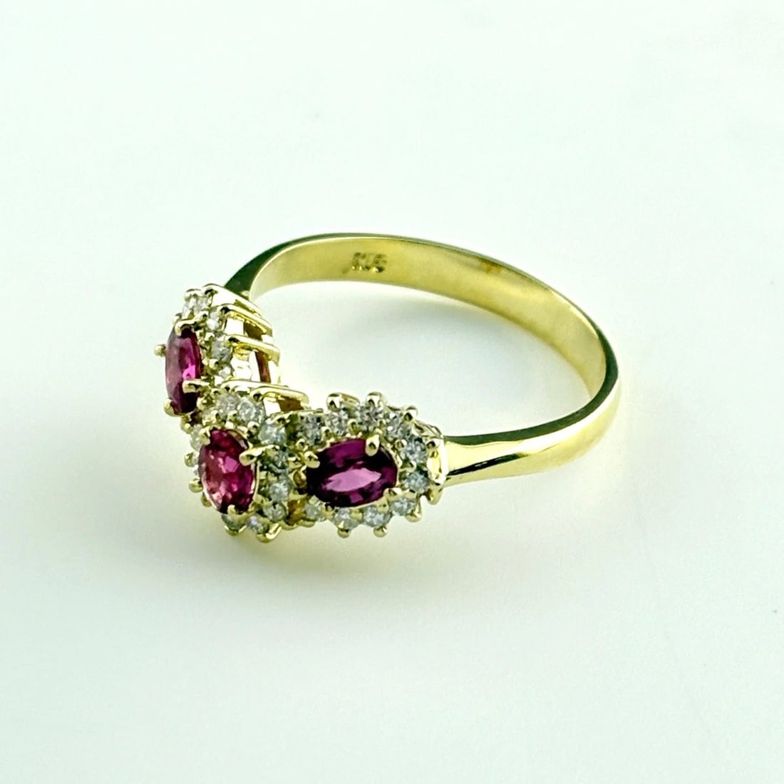 RUBY DESIGN RING YG YELLOWGOLD MELEE DIAMOND: ruby design ring YG YellowGold melee diamond Brand: Unbranded Type/Style: Ring Material: 18K YellowGold, Main Stone Ruby Color: YellowGold Size: US 6 Accessories: None Accessories Notice: When