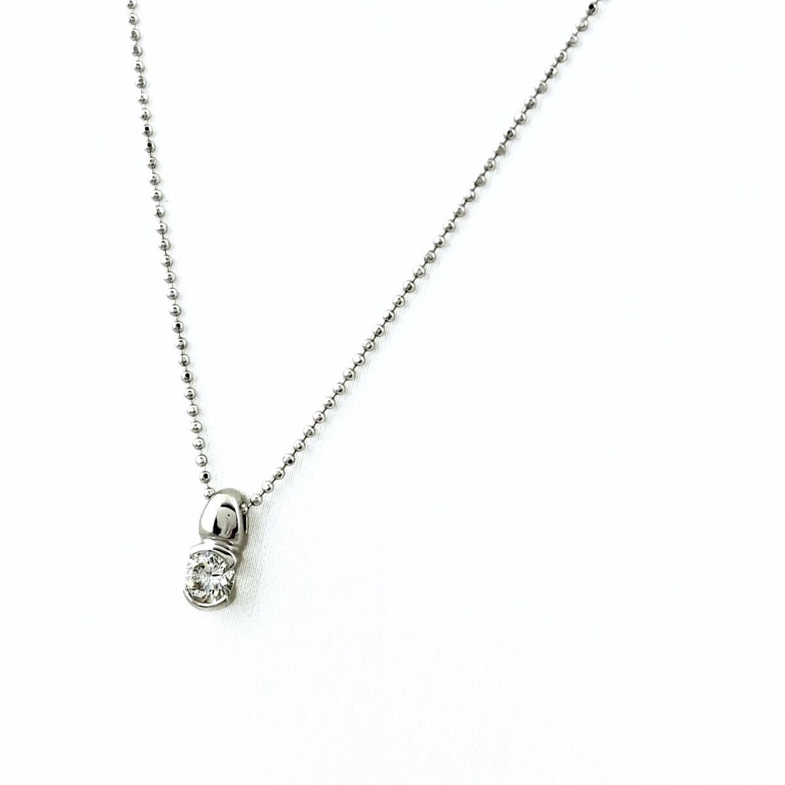 DIAMOND DESIGN PLATINUM PENDANT NECKLACE: Diamond design Platinum Pendant Necklace Brand: Unbranded Type/Style: Necklace Material: Pt900, Color: PT Size: Chain / code 47cm(18.5") Pendant size 9.7?4.2mm(0.4") Accessories: None Acce