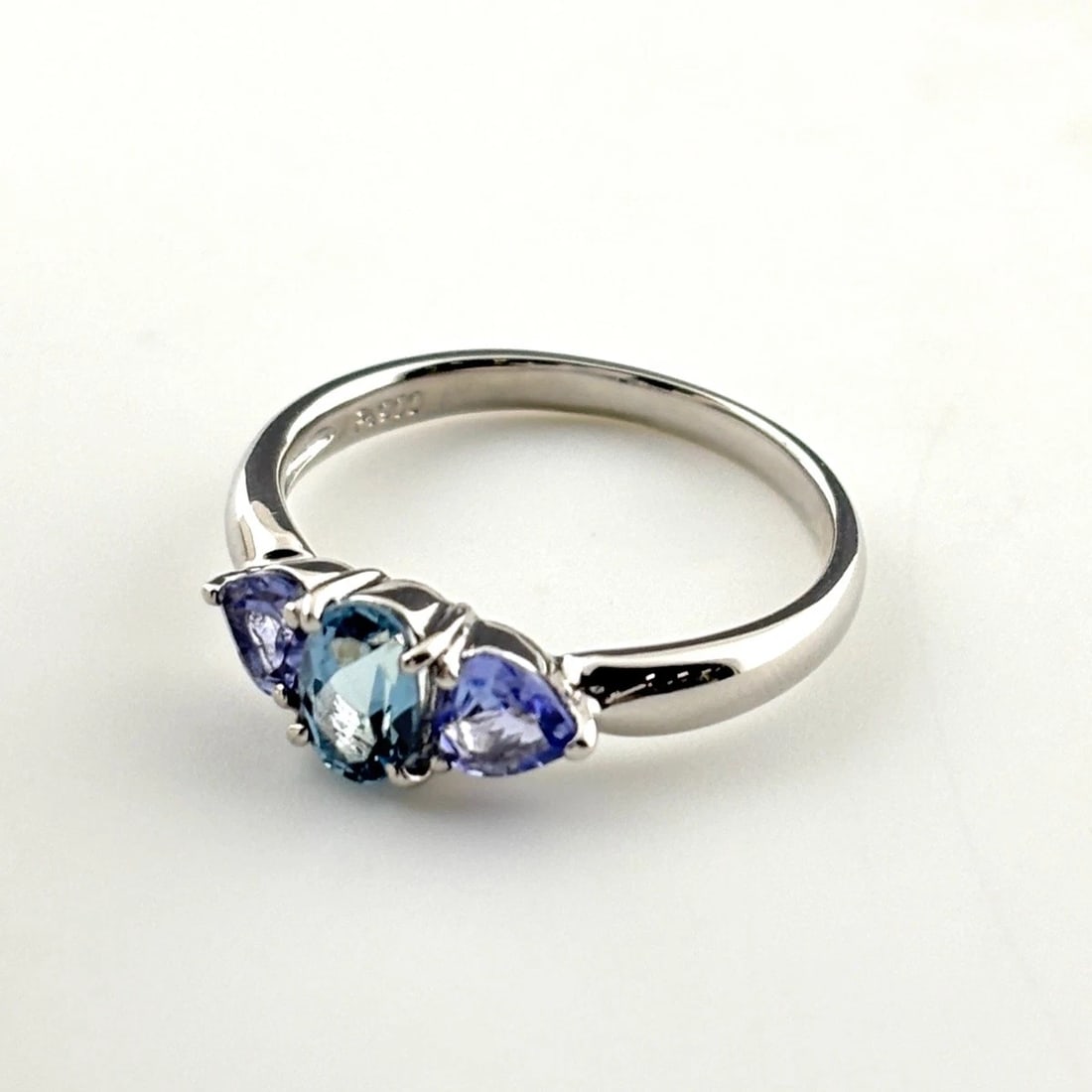 TANZANITE DESIGN RING PLATINUM MELEE DIAMOND: tanzanite design ring Platinum melee diamond Brand: Unbranded Type/Style: Ring Material: Pt900, Main Stone Tanzanite Aquamarine Color: PT Size: US 6 Accessories: None Accessories Notice: When