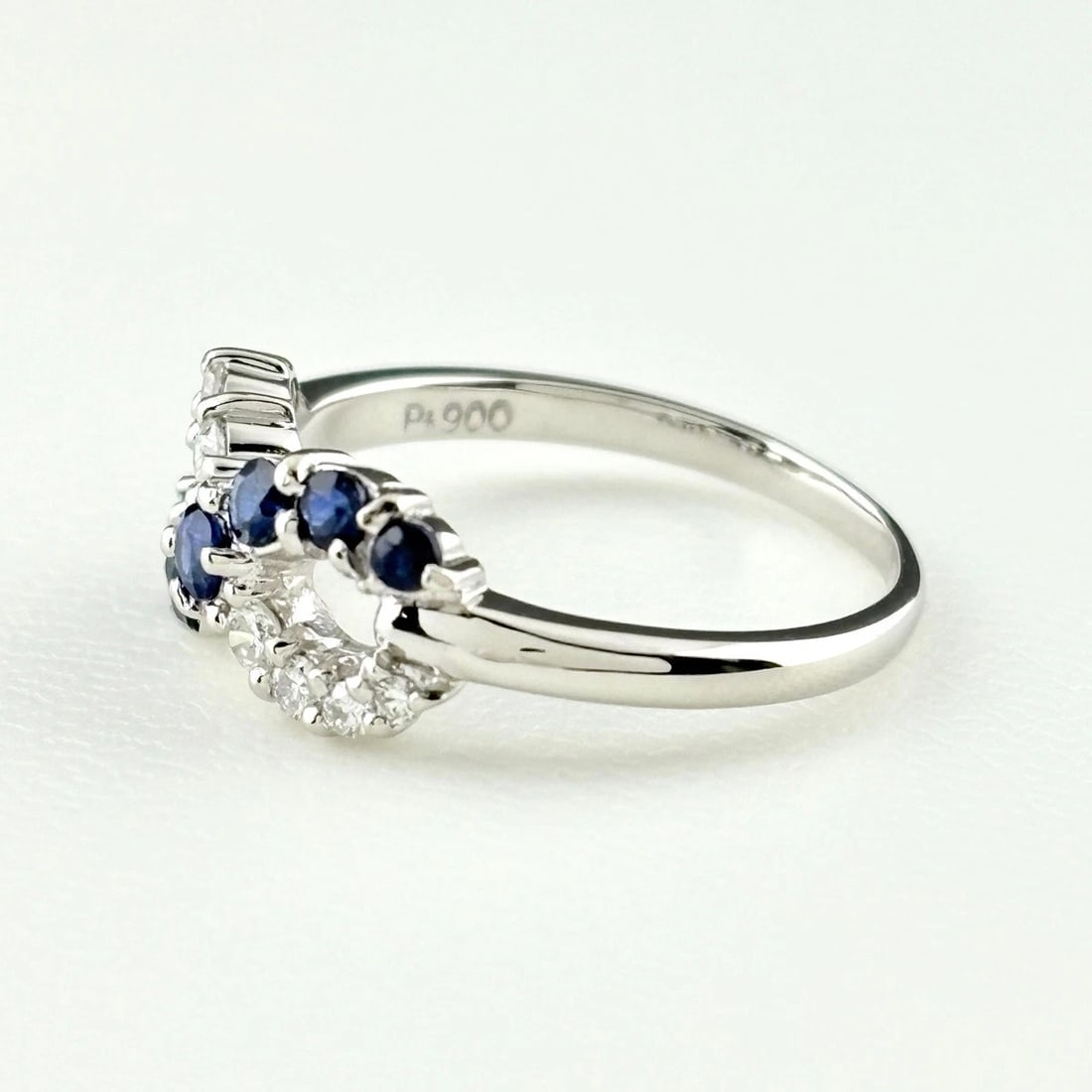 SAPPHIRE DESIGN RING PLATINUM RING MELEE DIAMOND: sapphire design ring Platinum ring melee diamond Brand: Unbranded Type/Style: Ring Material: Pt900, Main Stone sapphire Color: PT Size: US 6 to 6.5 Accessories: None Accessories Notice: When